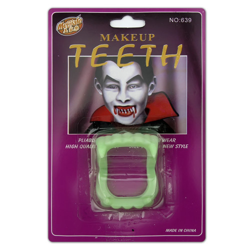 Зуби Вампіра світлонакопичувачі на блістері